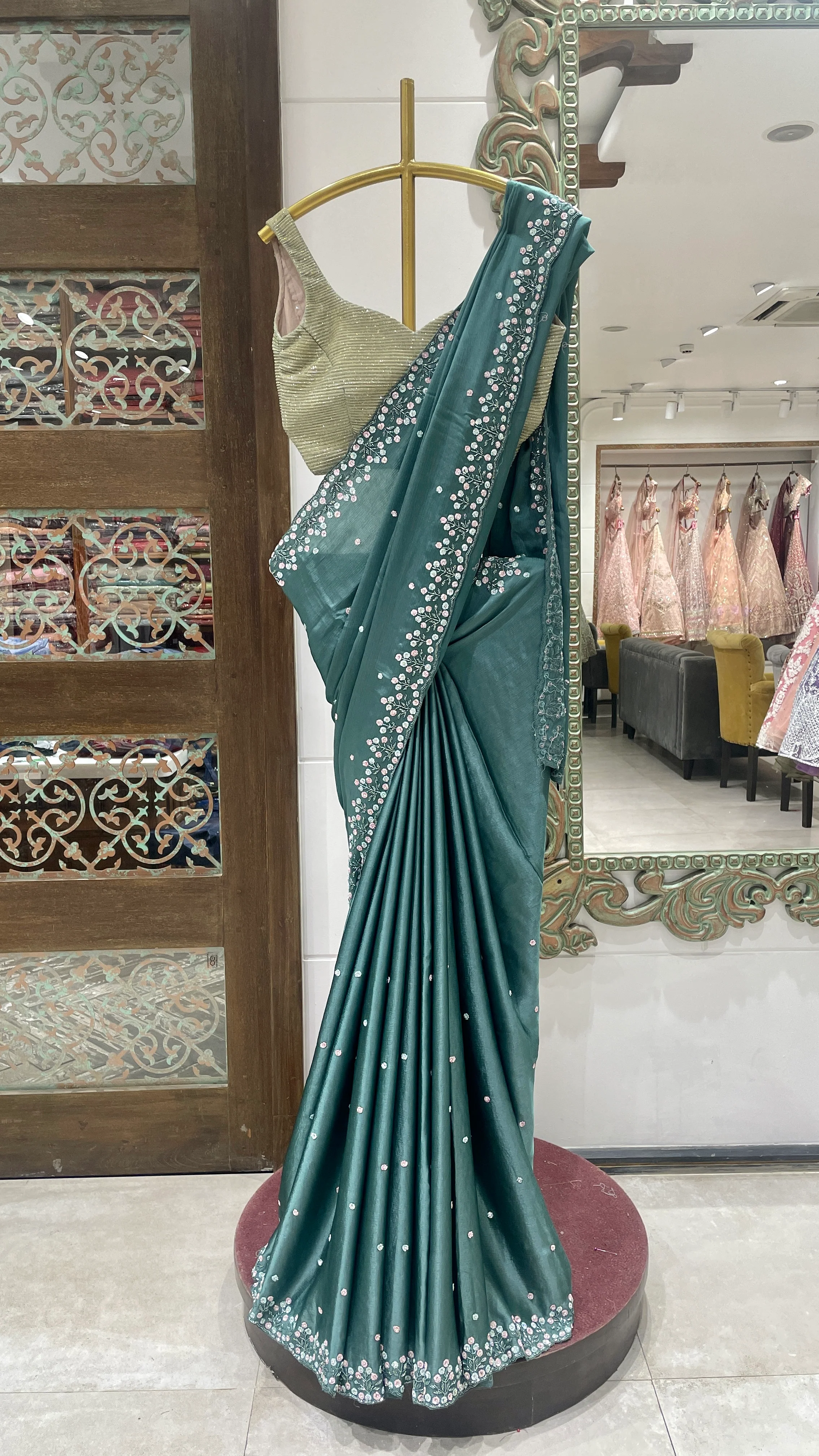 Teal Green Saree with Silver Embroidered Border and Golden Blouse
