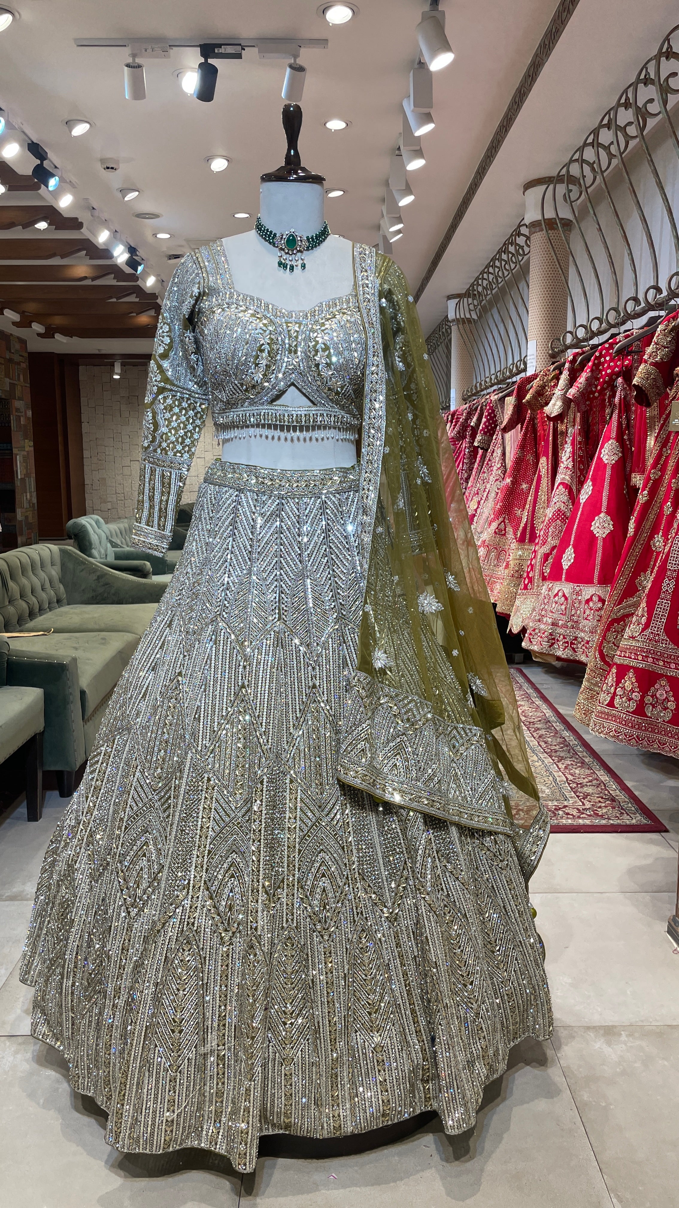 Green Net Lehenga with Silver Embellishments