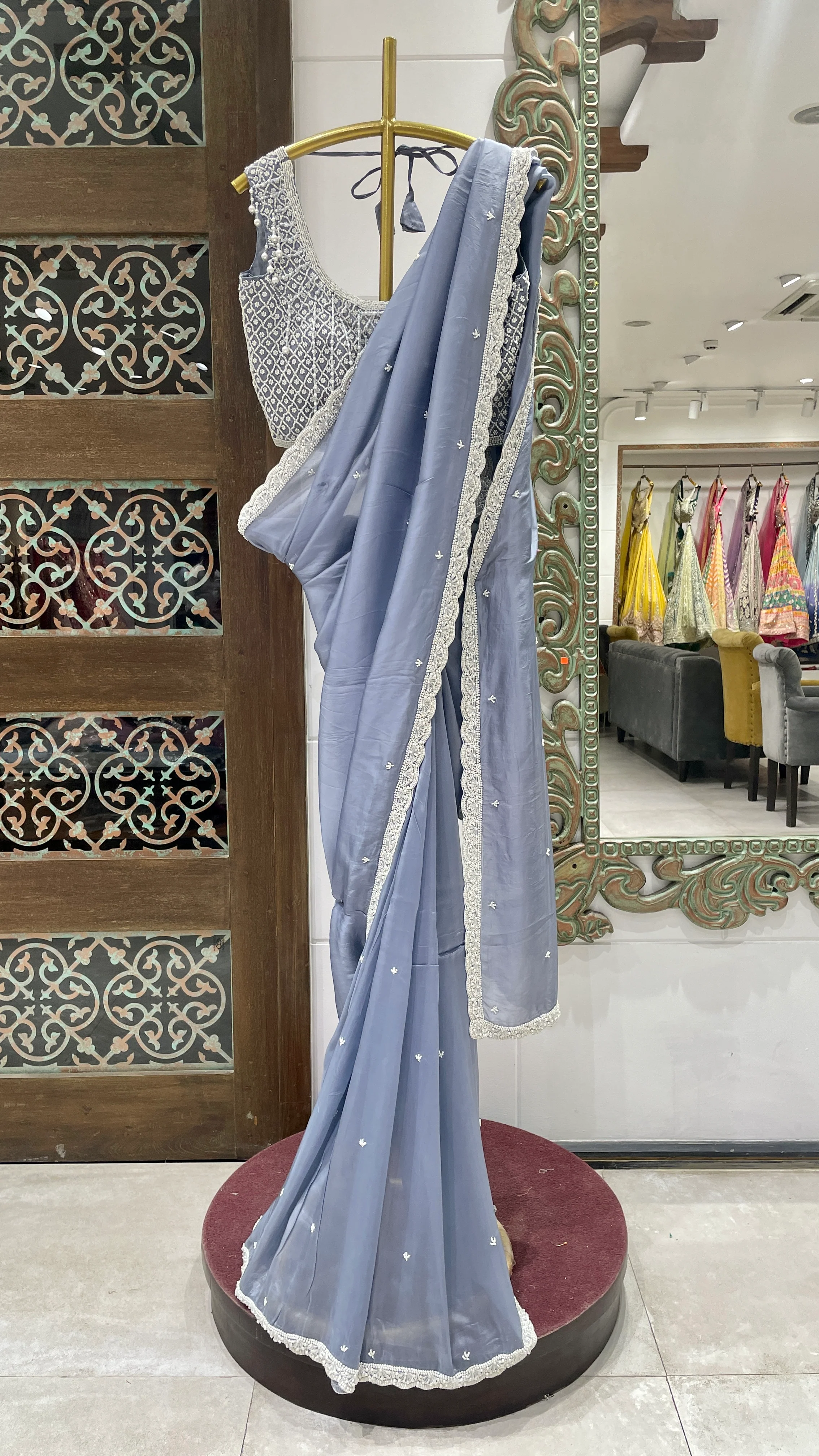Powder Blue Saree with White Embroidered Border and Silver Blouse