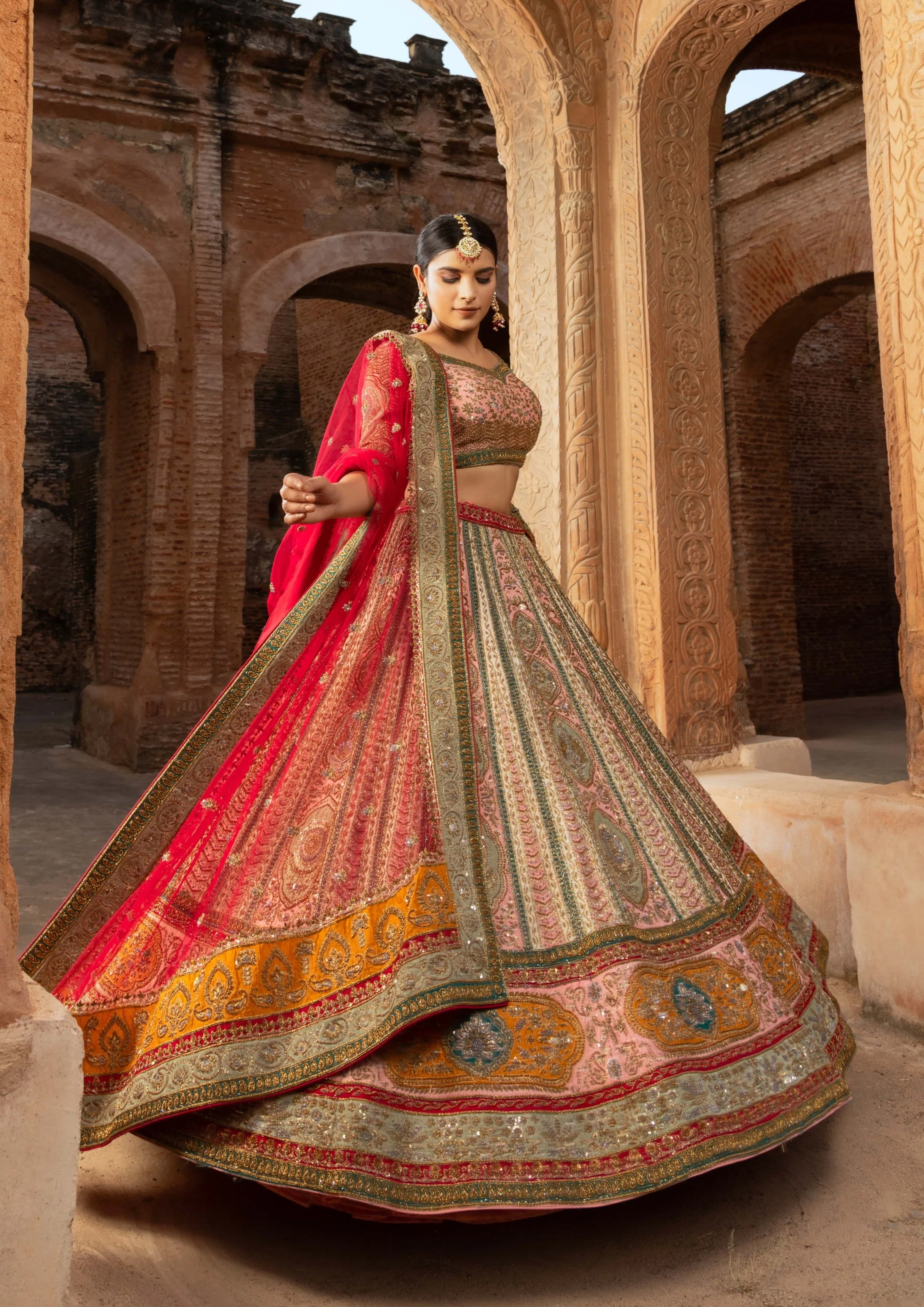 Opulent Silk Bridal Lehenga with Hues and Heavy Zardozi Accents
