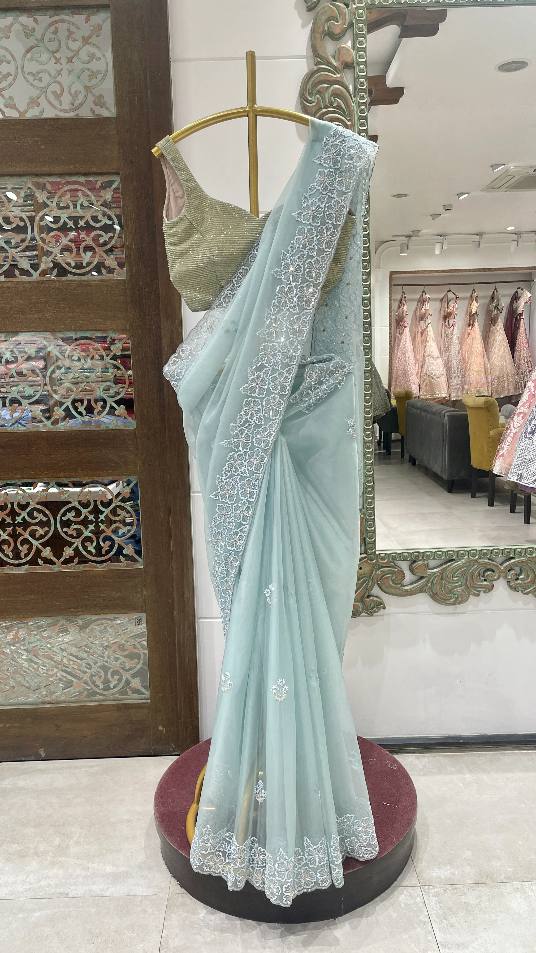 Pastel Aqua Blue Saree with Silver Embroidery and Golden Blouse
