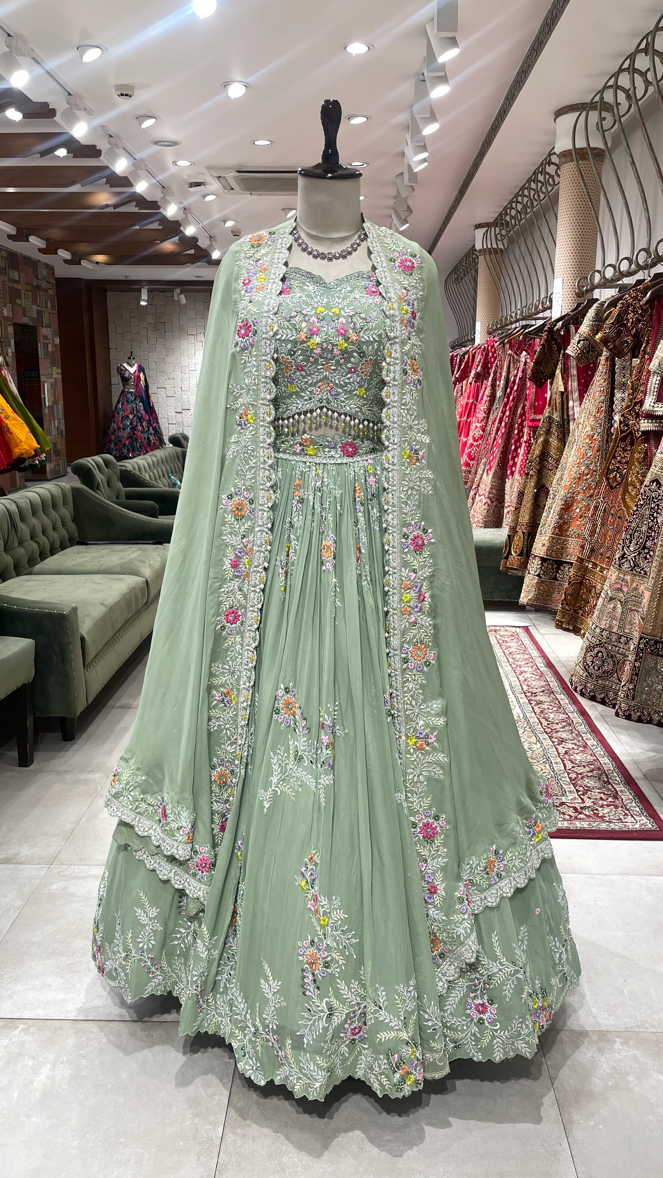 Pastel Green Georgette Lehenga with Cape & Floral Motifs