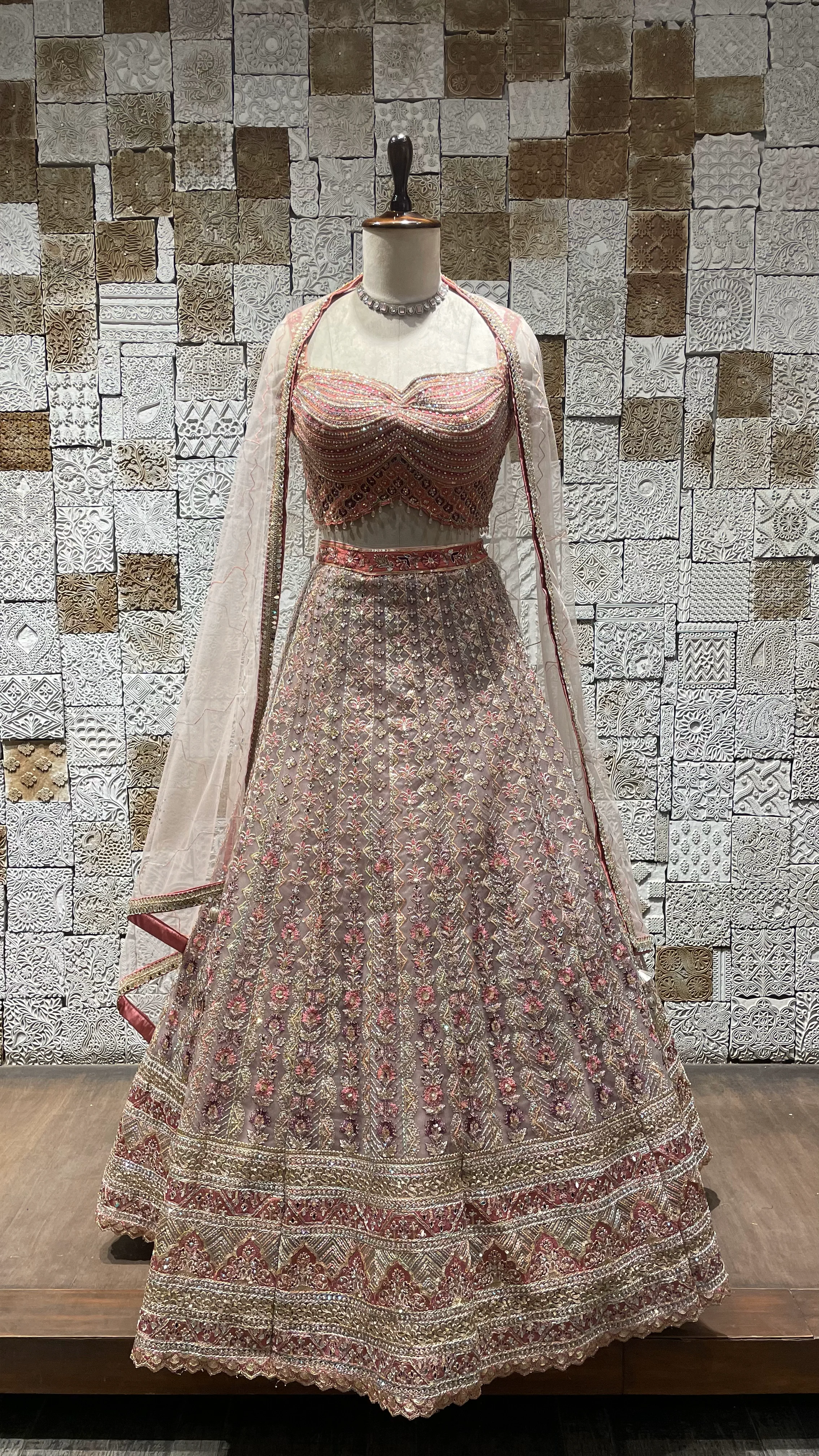 Pink Net Lehenga with Gold Zariwork, Rhinestones & Tassel Blouse