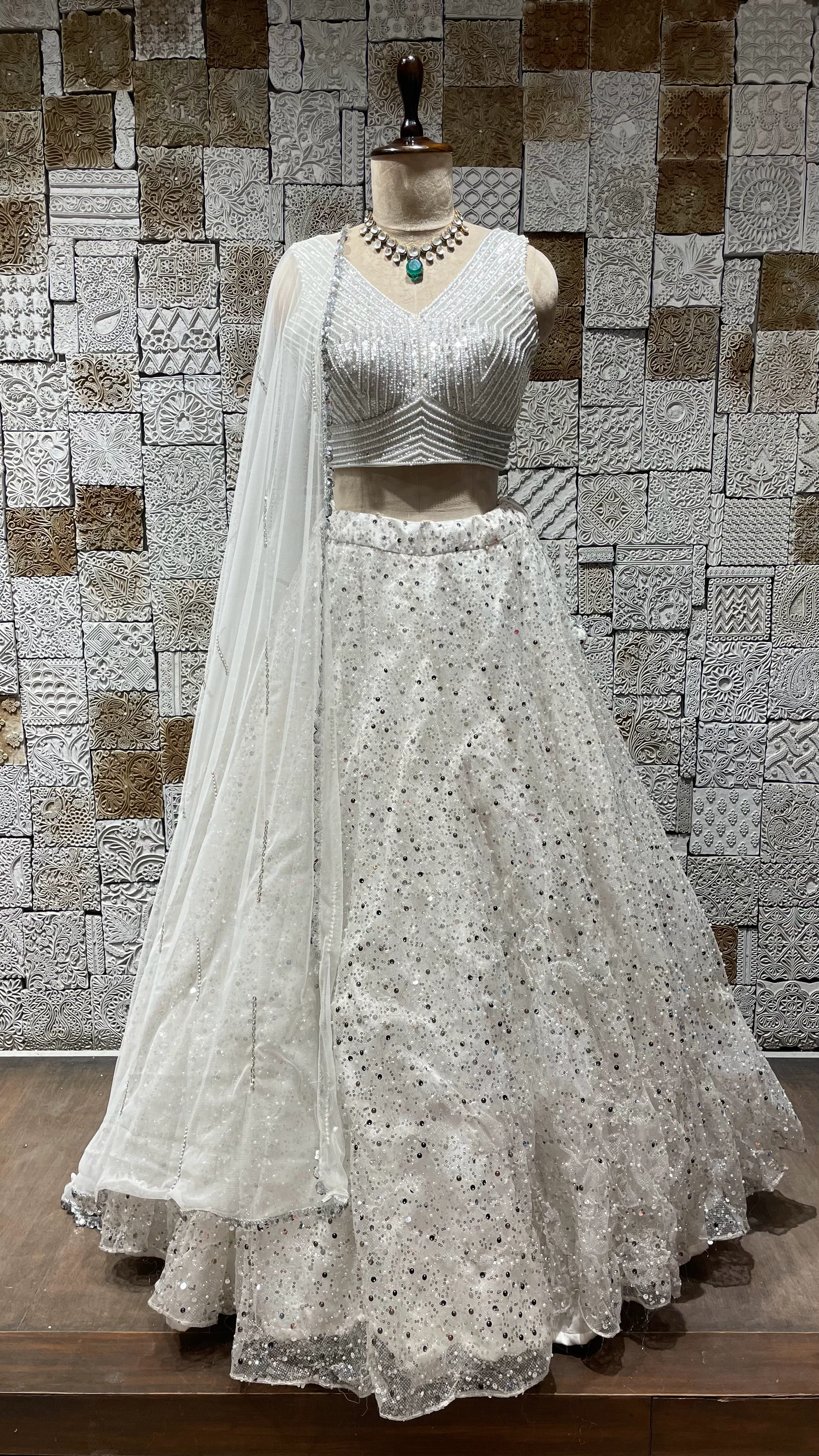 White Net Lehenga with Heavy Embellished Blouse